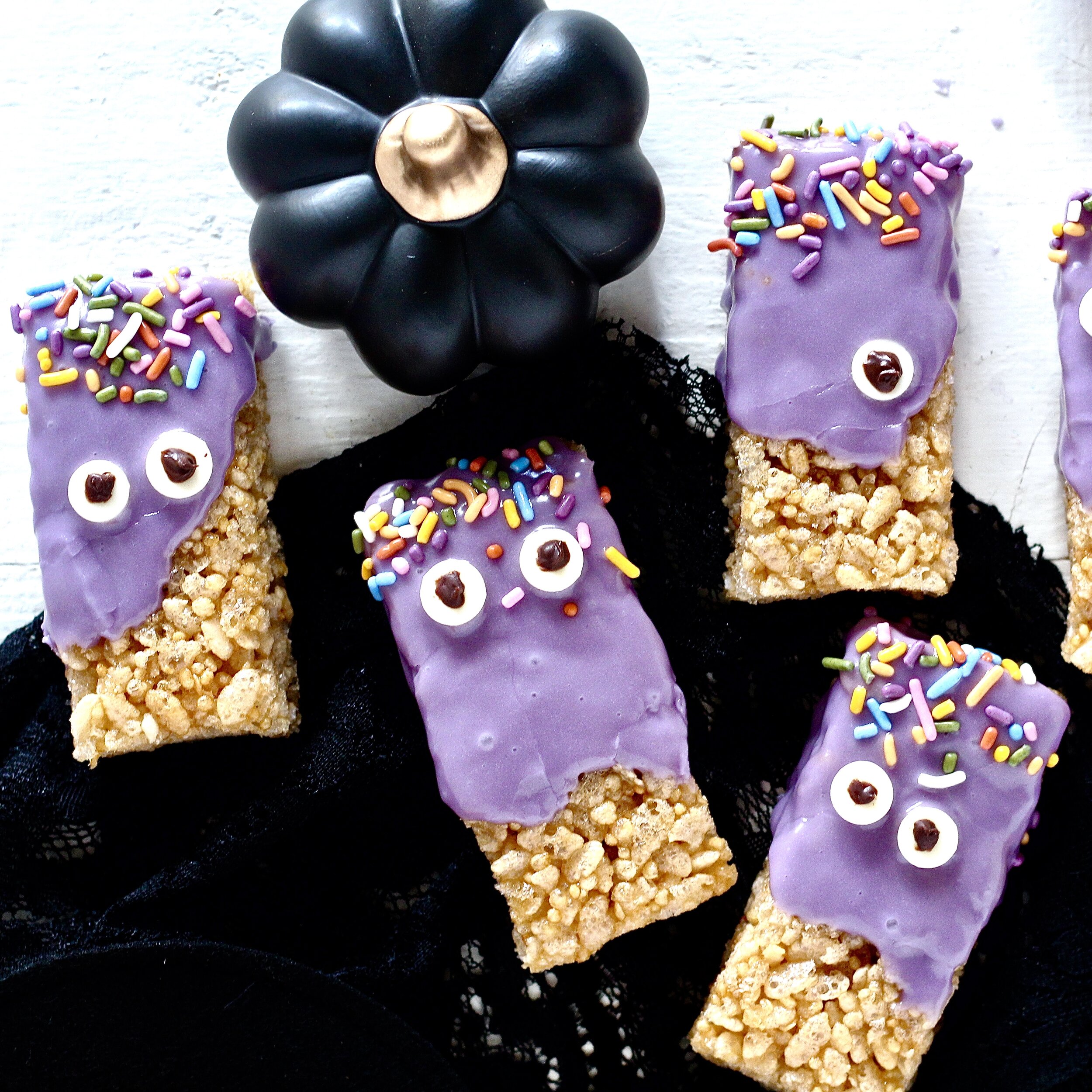 Purple Monster Halloween Treats with black pumpkin