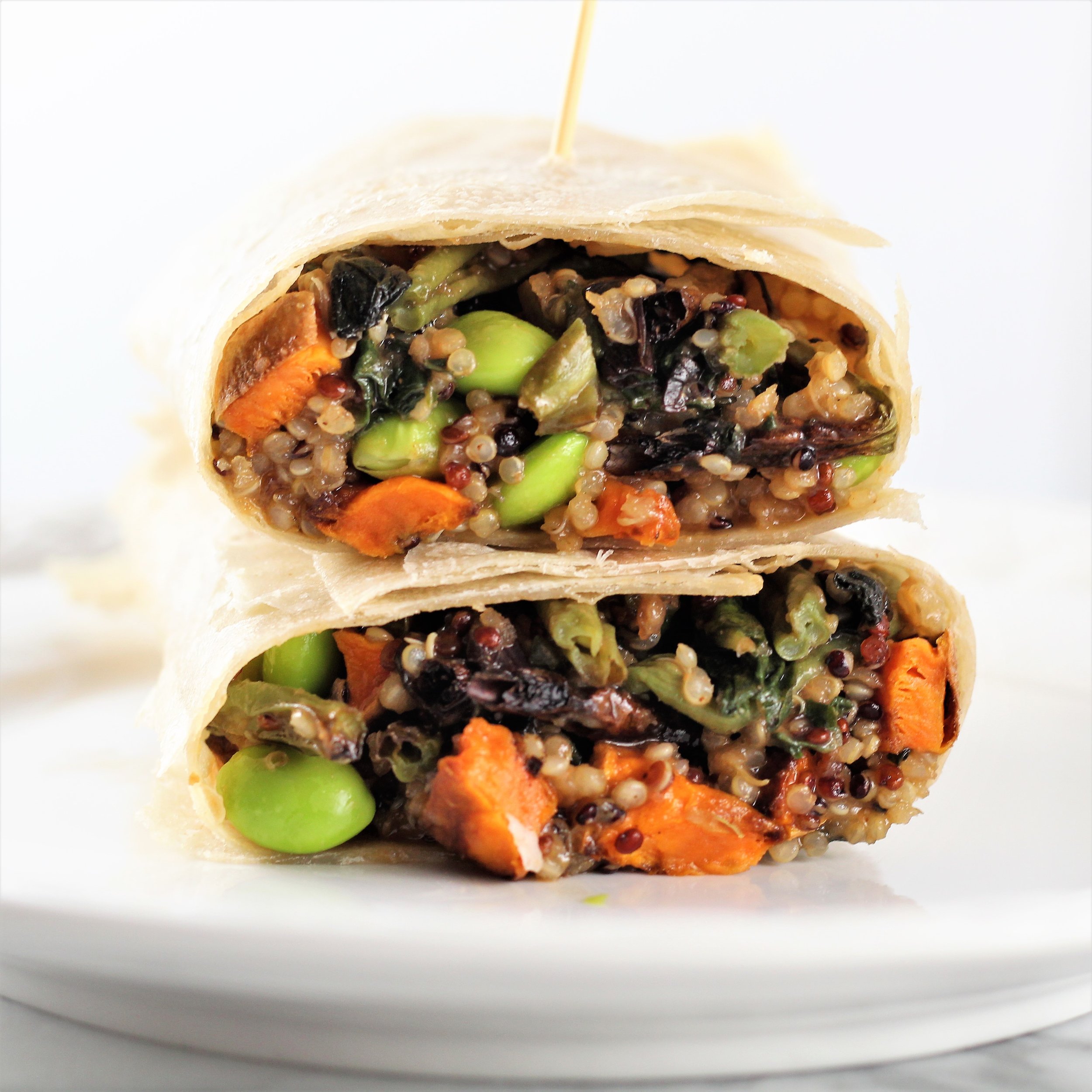 Thai Veggie Protein Wraps stacked on a plate