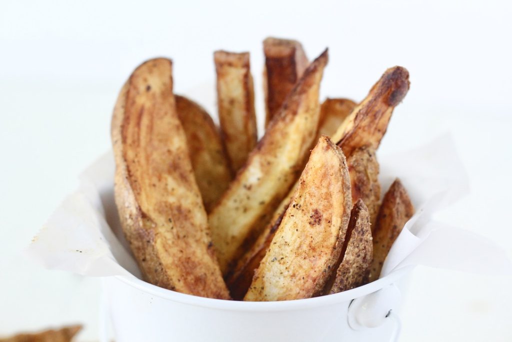 potato wedges in white bucket