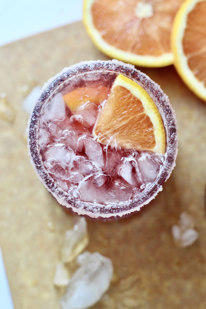 pomegranate martini with orange wedge for type 1 diabetes and alcohol