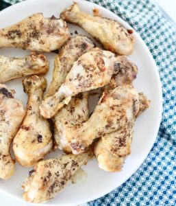 drumsticks on a plate with blue towel