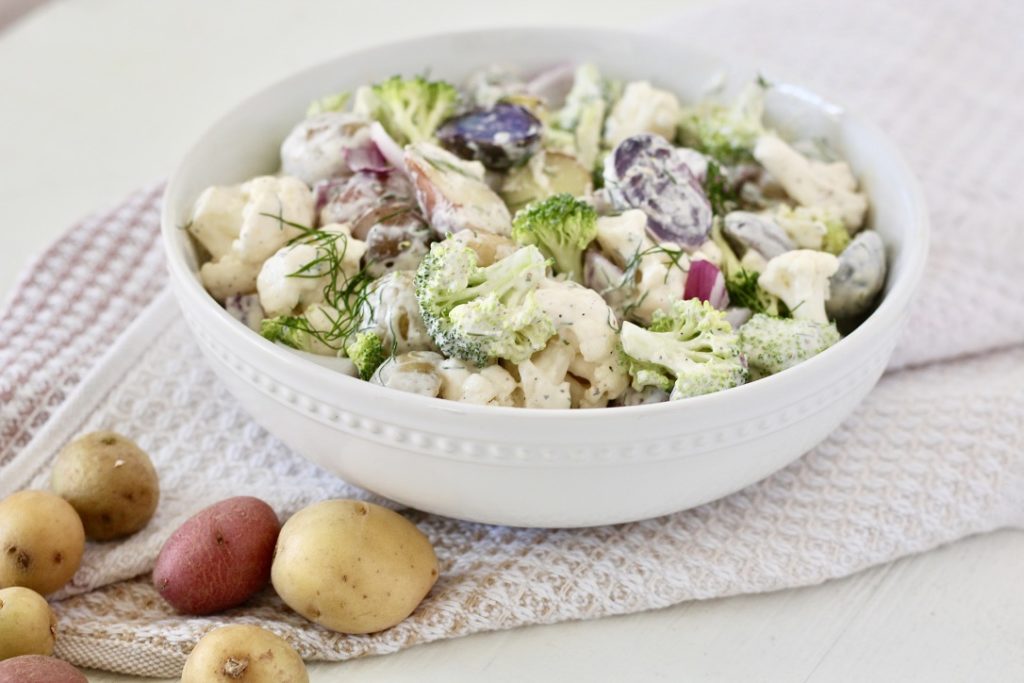 potato salad in bowl with potatoes