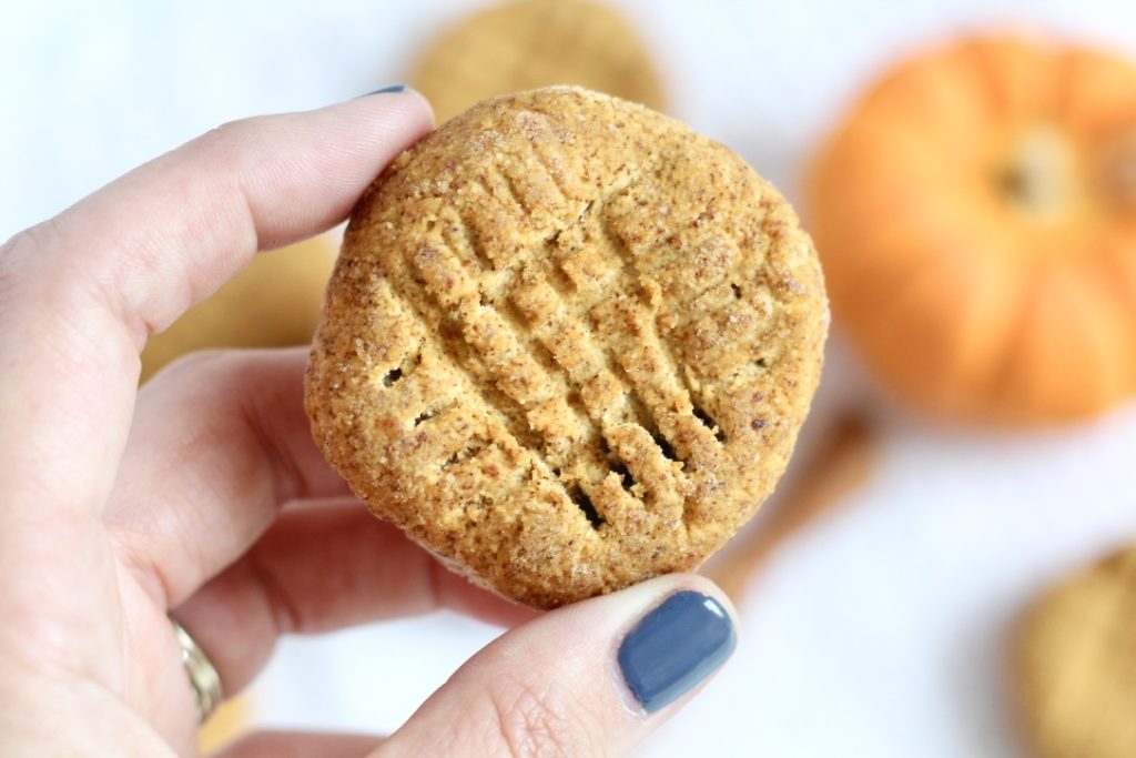 pumpkin cookie with grey gel nail polish