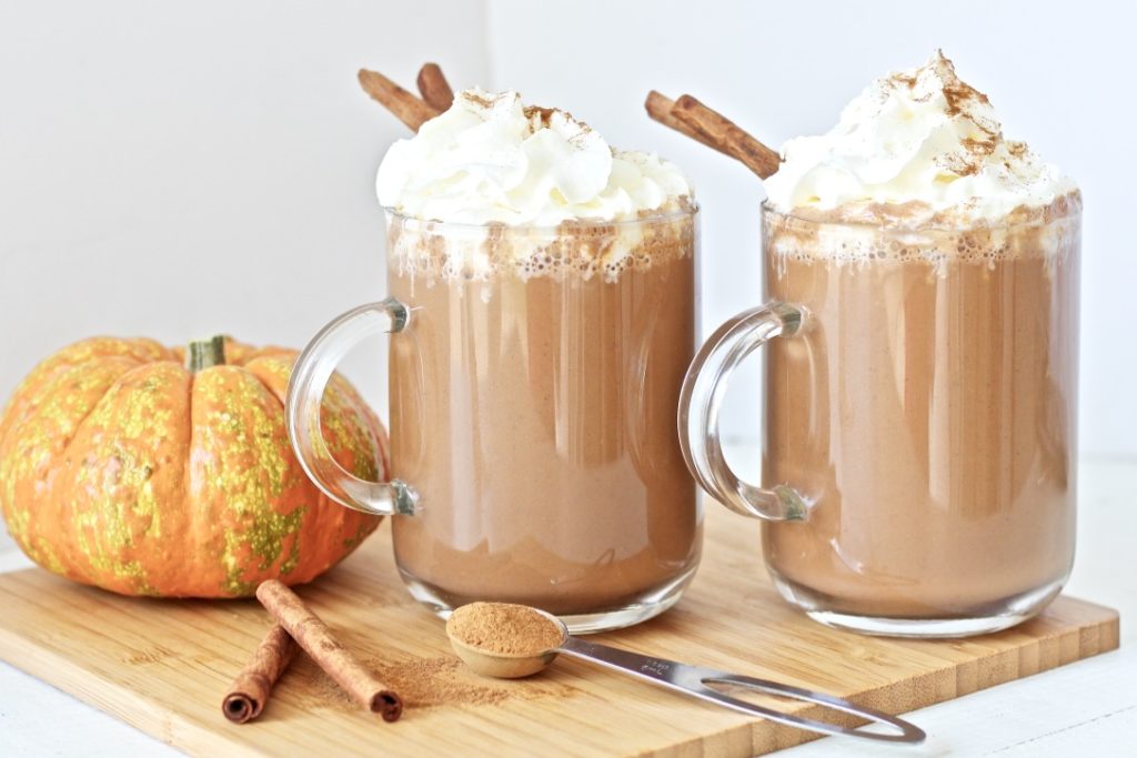 two clear coffee mugs with hot chocolate