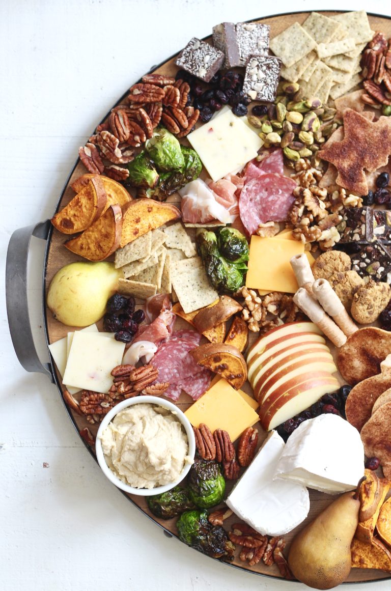 fall charcuterie board on round wood and metal platter