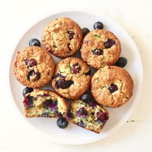 blueberry zucchini muffins on white plate