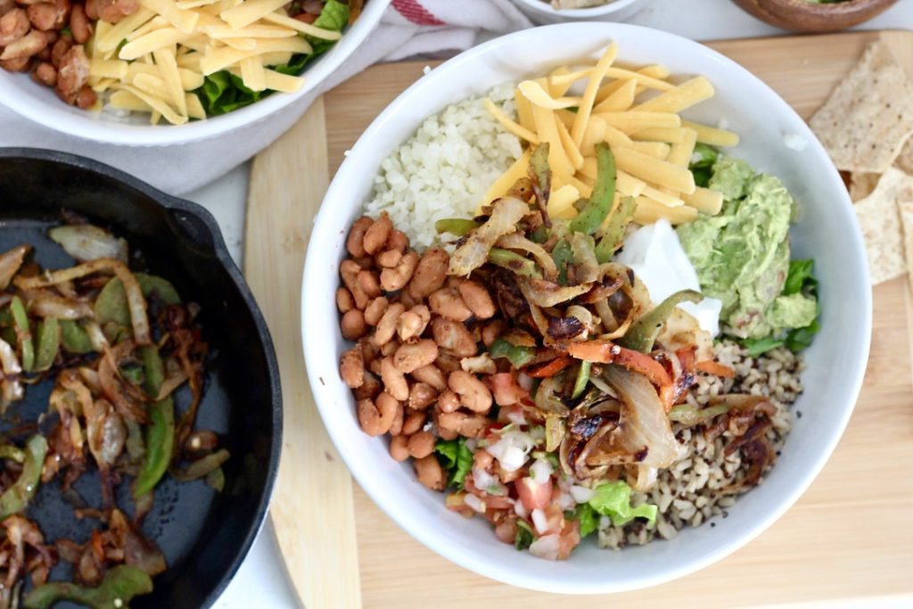 low cafrb burrito bowl with sauteed peppers