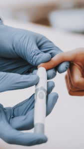 finger being pricked for new treatments for diabetes