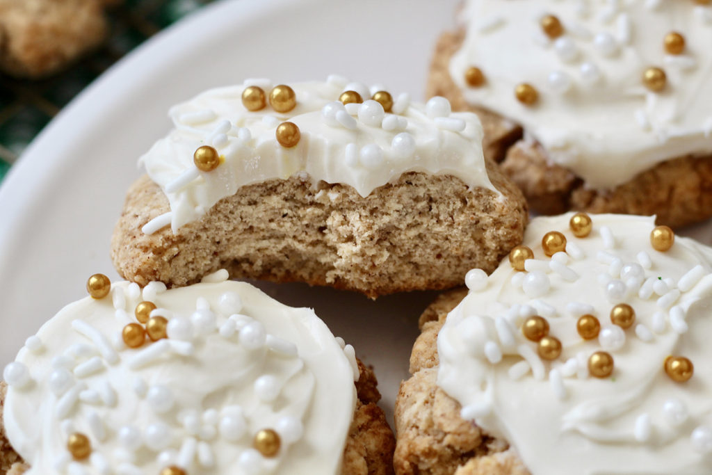 gluten free gingerbread cookies with cream cheese icing and sprinkles